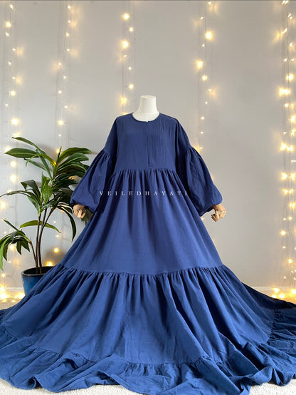 Mannequin wearing a navy blue colored organic 100% cotton abaya. Dark blue pure cotton abaya. Natural abaya with nursing friendly hidden zipper and deep pockets. Cute modest cotton abaya. All natural.